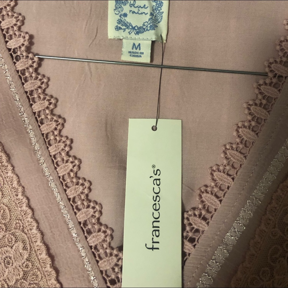 Francesca’s pink lace blouse